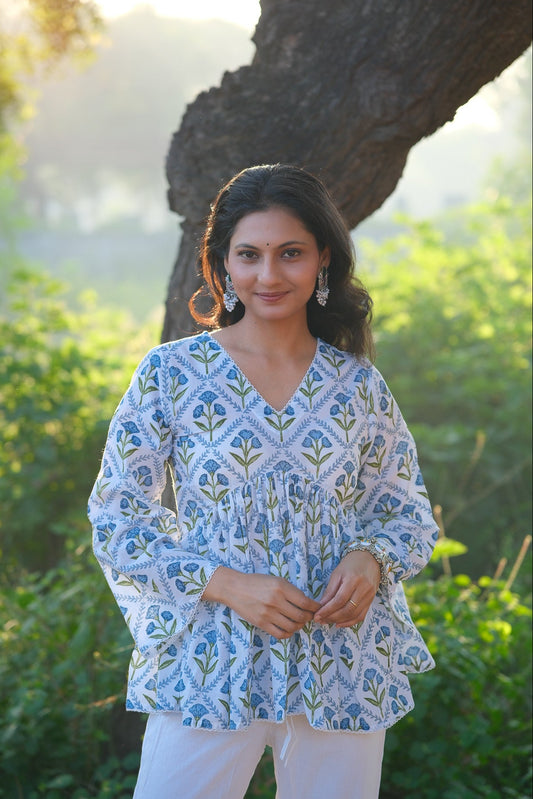 Nayara – Floral Cotton Peplum Top