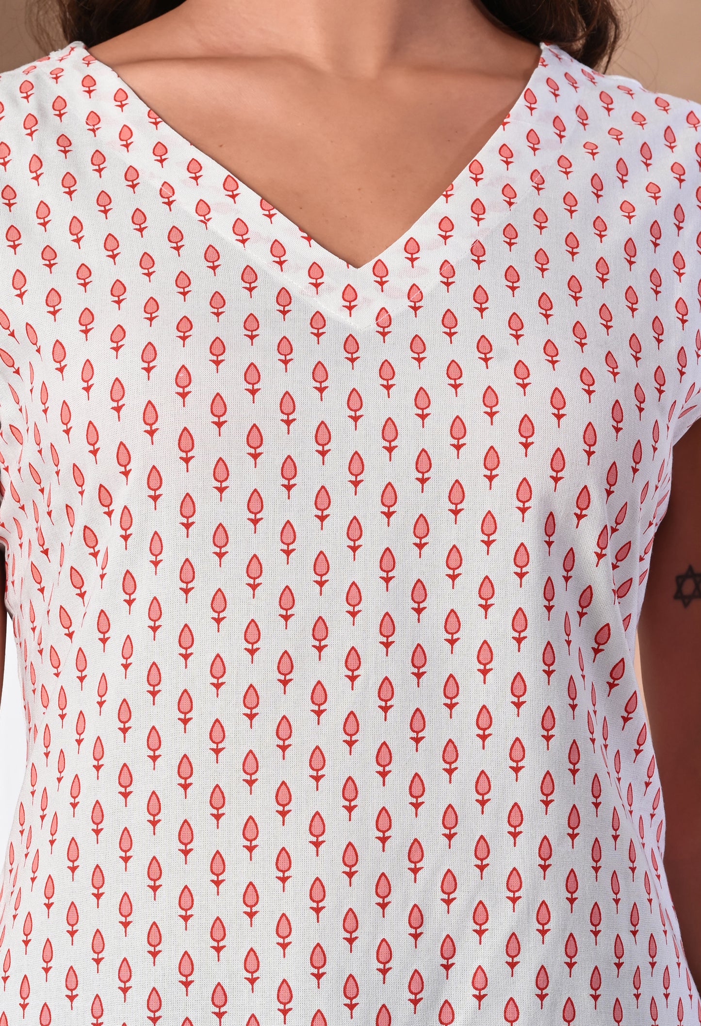 Crimson Leaf White V-Neck Sleeveless Top