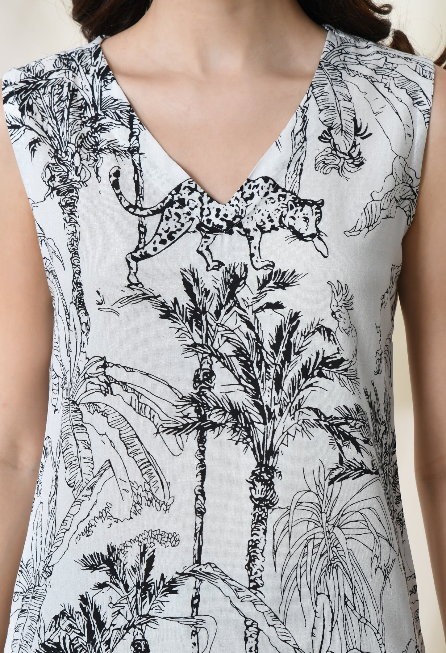 Jungle Chic Animal Printed V-Neck White Sleeveless Top