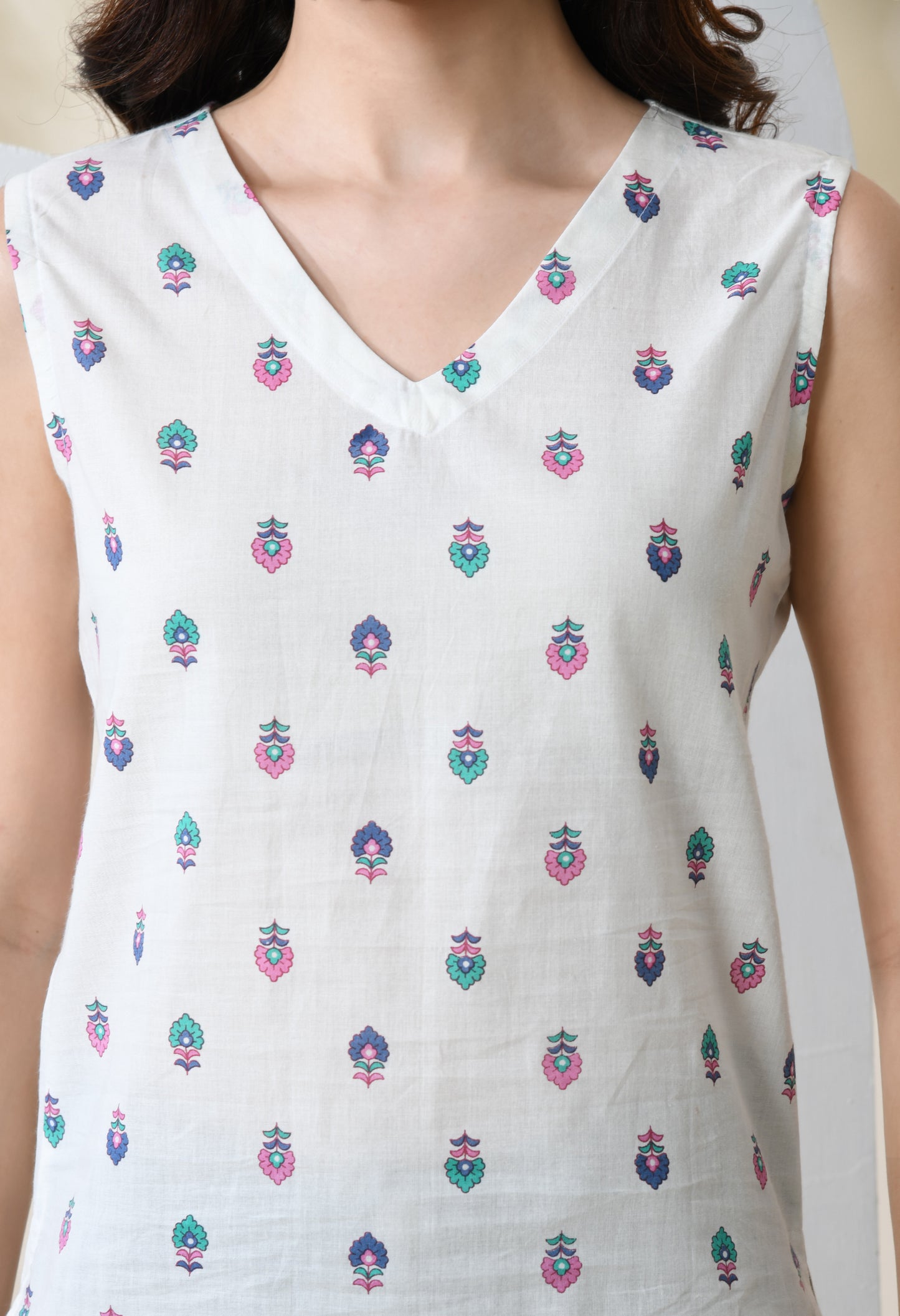 Whispering Petals White V-Neck Sleeveless Top